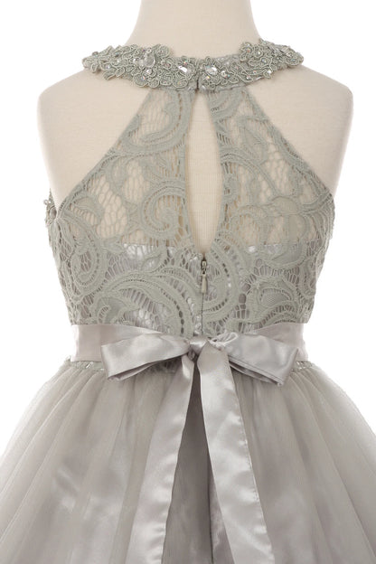 Details of the Silver kids dress show keyhole opening framed by lace.