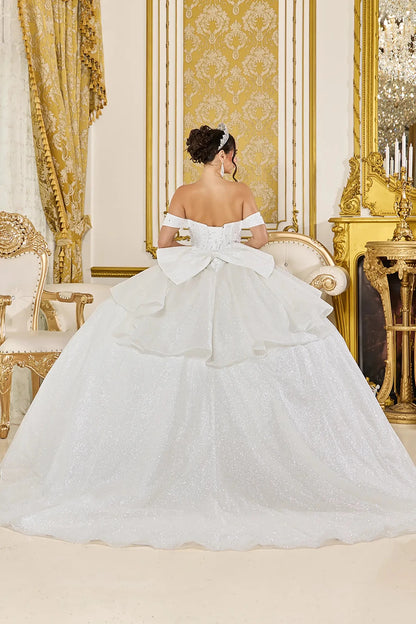 Off white quinceanera ball gown back view showing lace up corset back, oversized layered bow detail, shimmering tulle skirt, and sweeping train