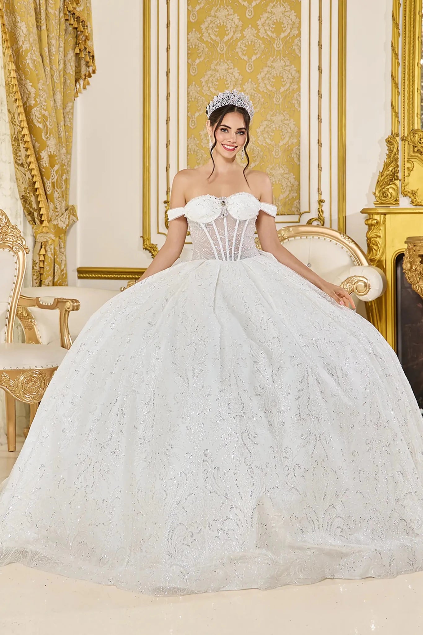 Off white quinceanera ball gown front view featuring off the shoulder sweetheart corset bodice, sheer boning detail, textured glitter fabric, and full voluminous skirt