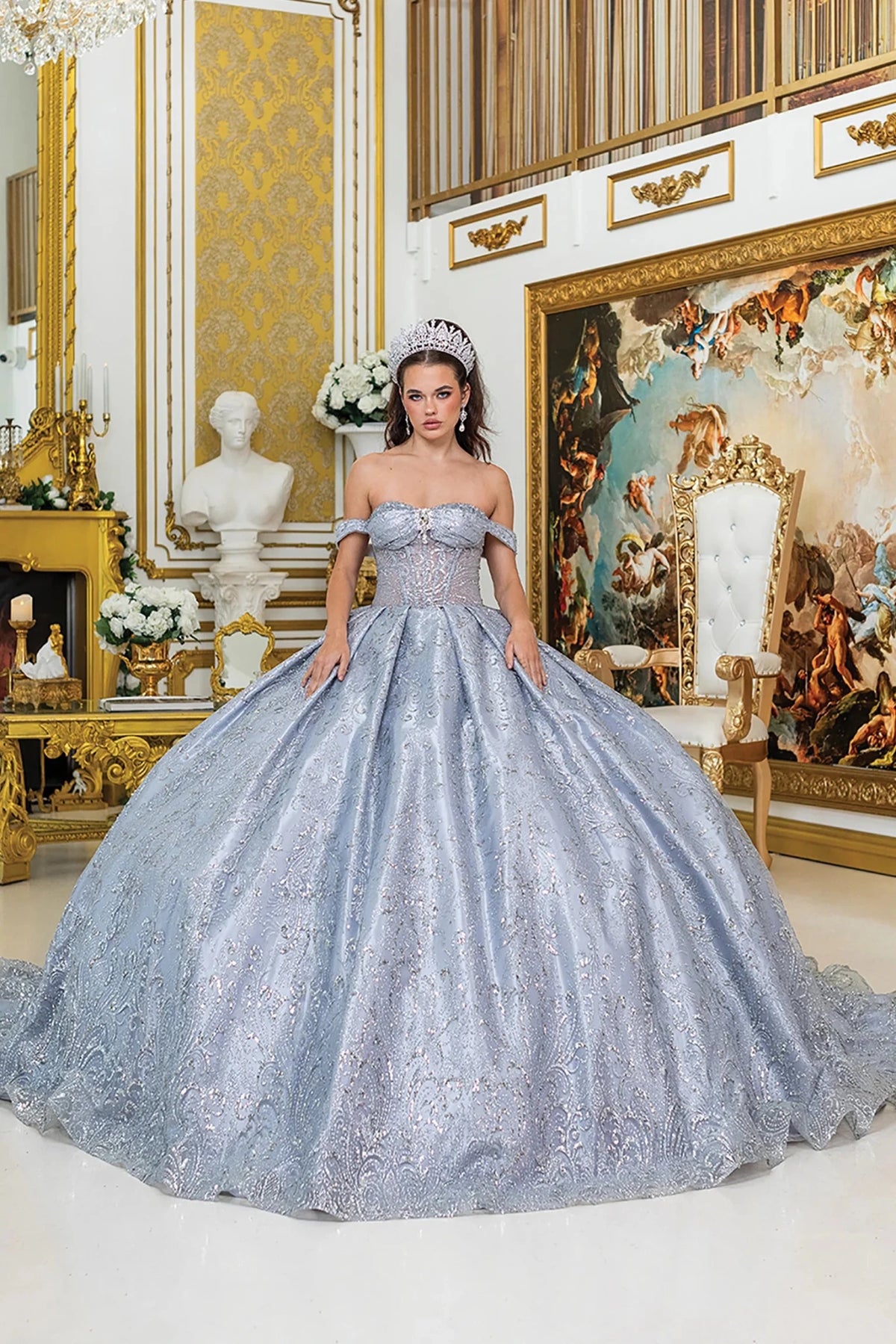 silver off-the-shoulder ball gown with intricate lace embroidery and a matching tiara