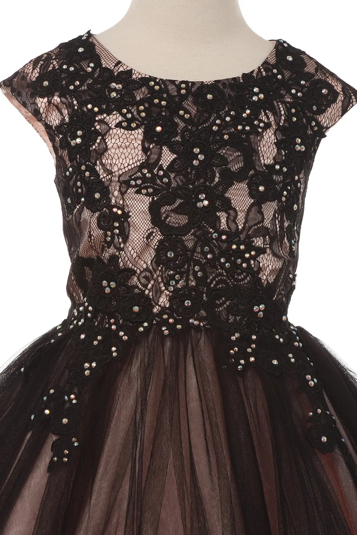 Floral lace overlays the pale bodice of the Black/Blush kids party dress.