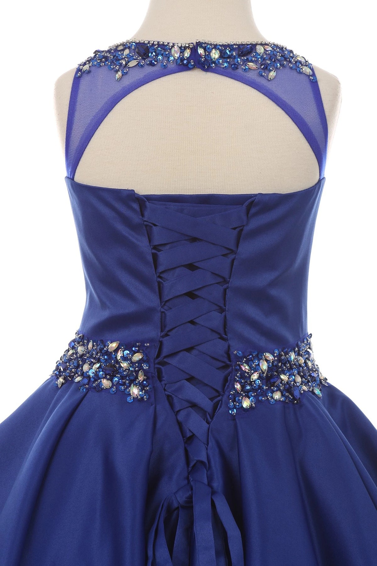 Visible details on the Royal Blue mini quince dress include a keyhole back and beaded lace-up waist.