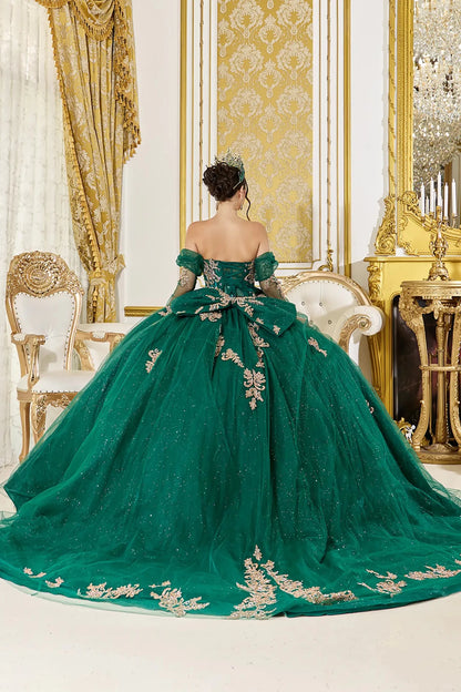 Back view of hunter green quinceañera ball gown featuring a lace-up corset back, oversized bow accent, and long flowing glitter tulle train with gold applique detailing