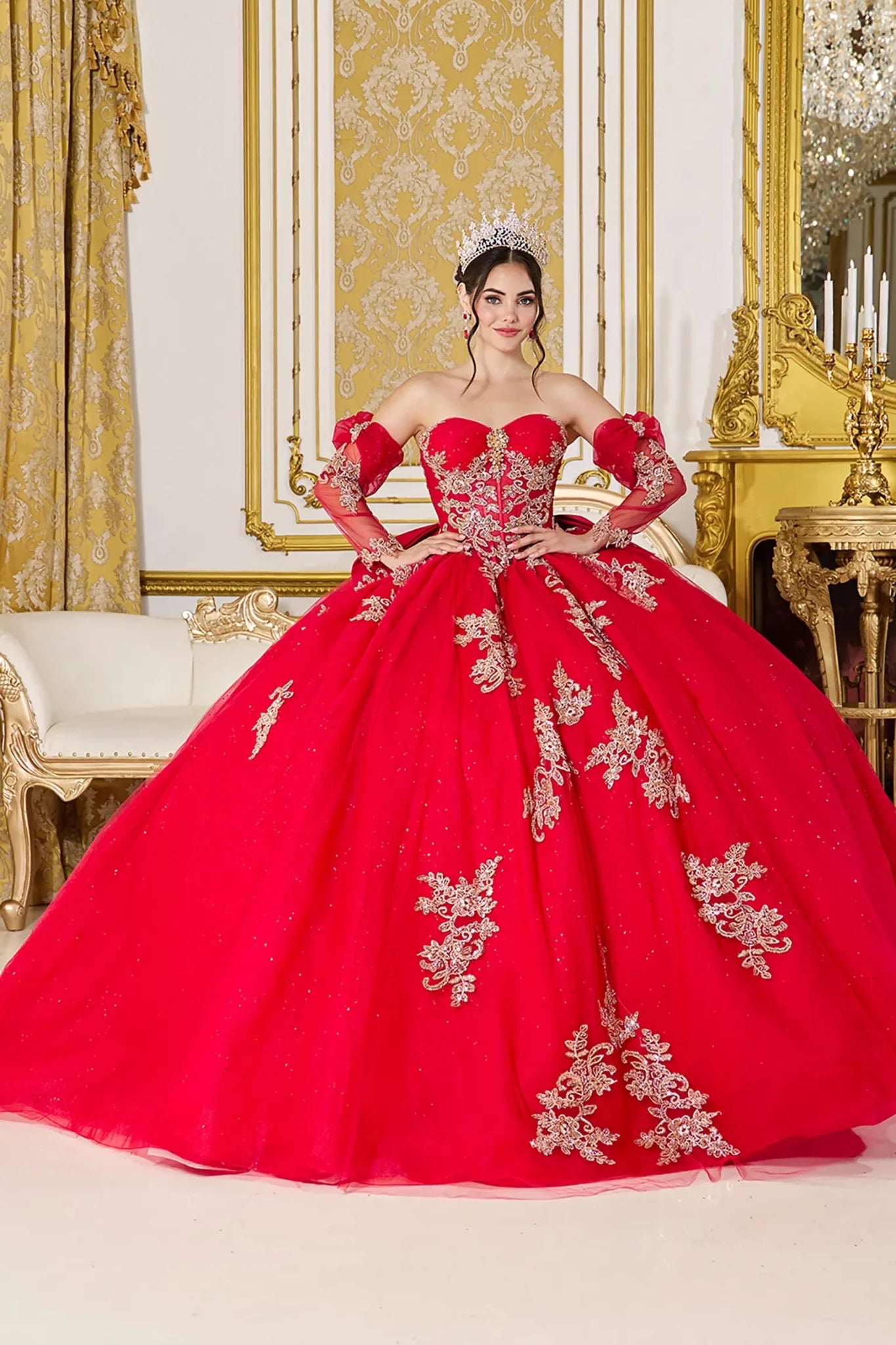 Front view of red quinceañera ball gown with off-the-shoulder sweetheart bodice, gold lace appliques, sheer corset detail, and full glitter tulle skirt