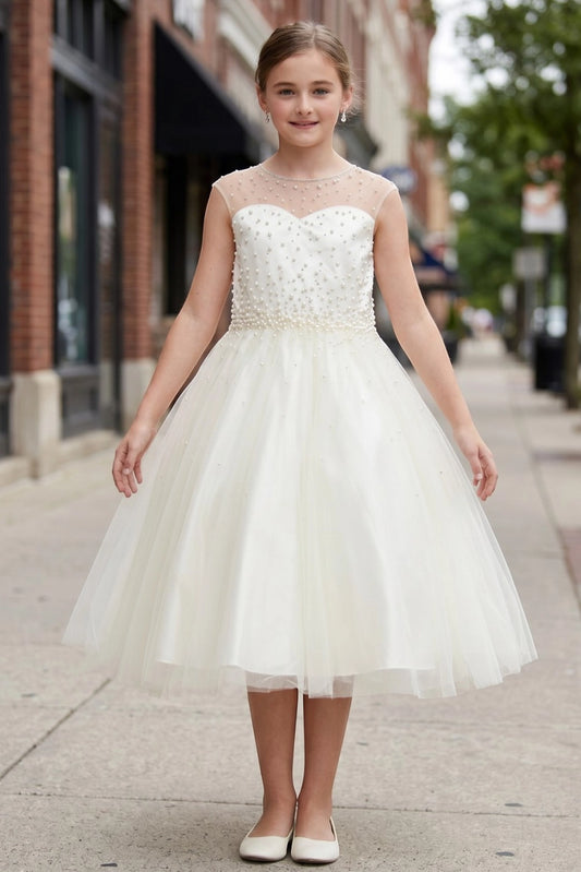 Featuring with a layered tulle skirt, this Ivory kids party dress displays elegant detail.