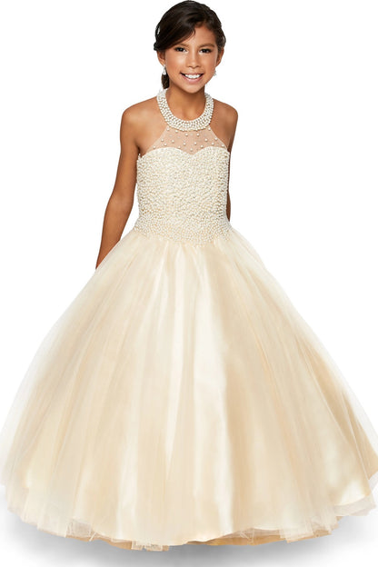 Champagne mini quince dress with a pearl bodice and full tulle skirt.
