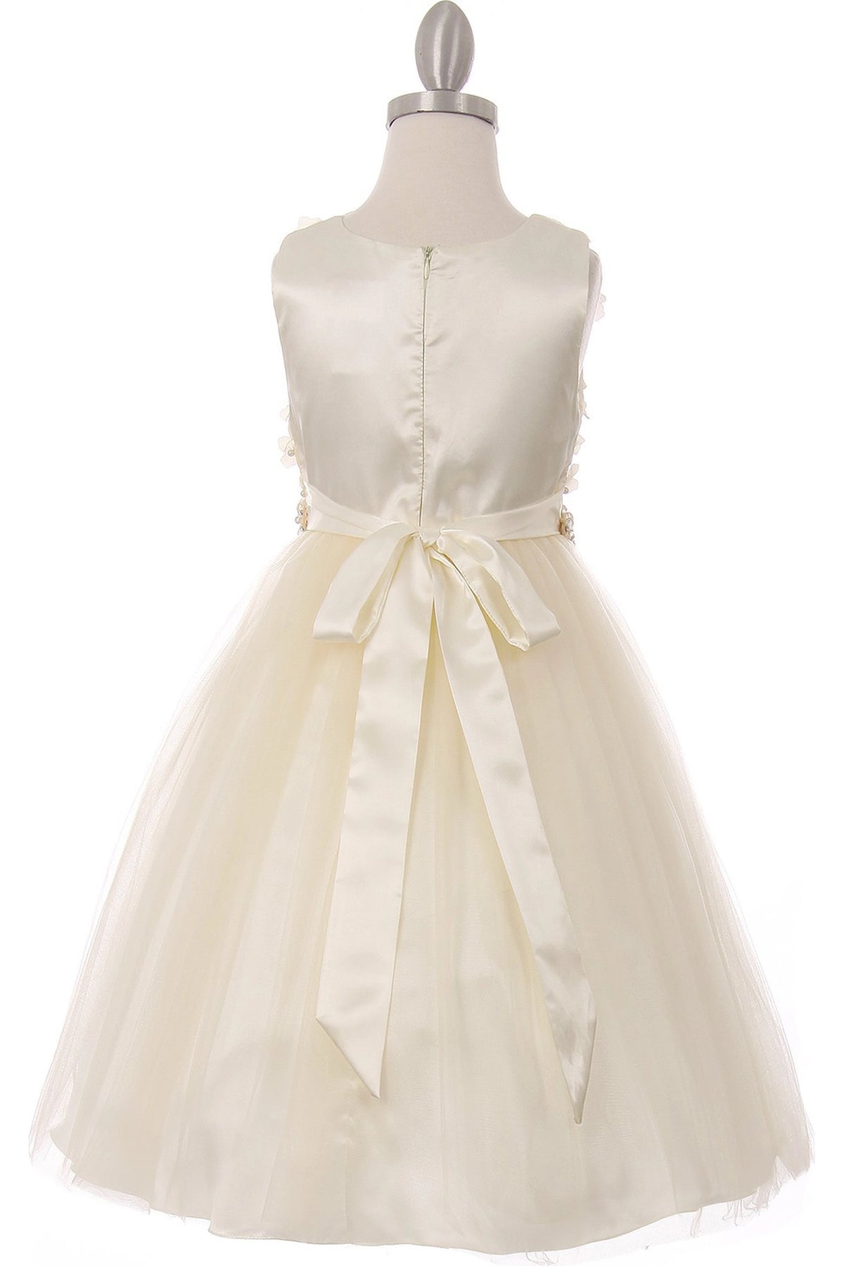 Finished details of a satin waist bow distinguish the Champagne kids party dress.