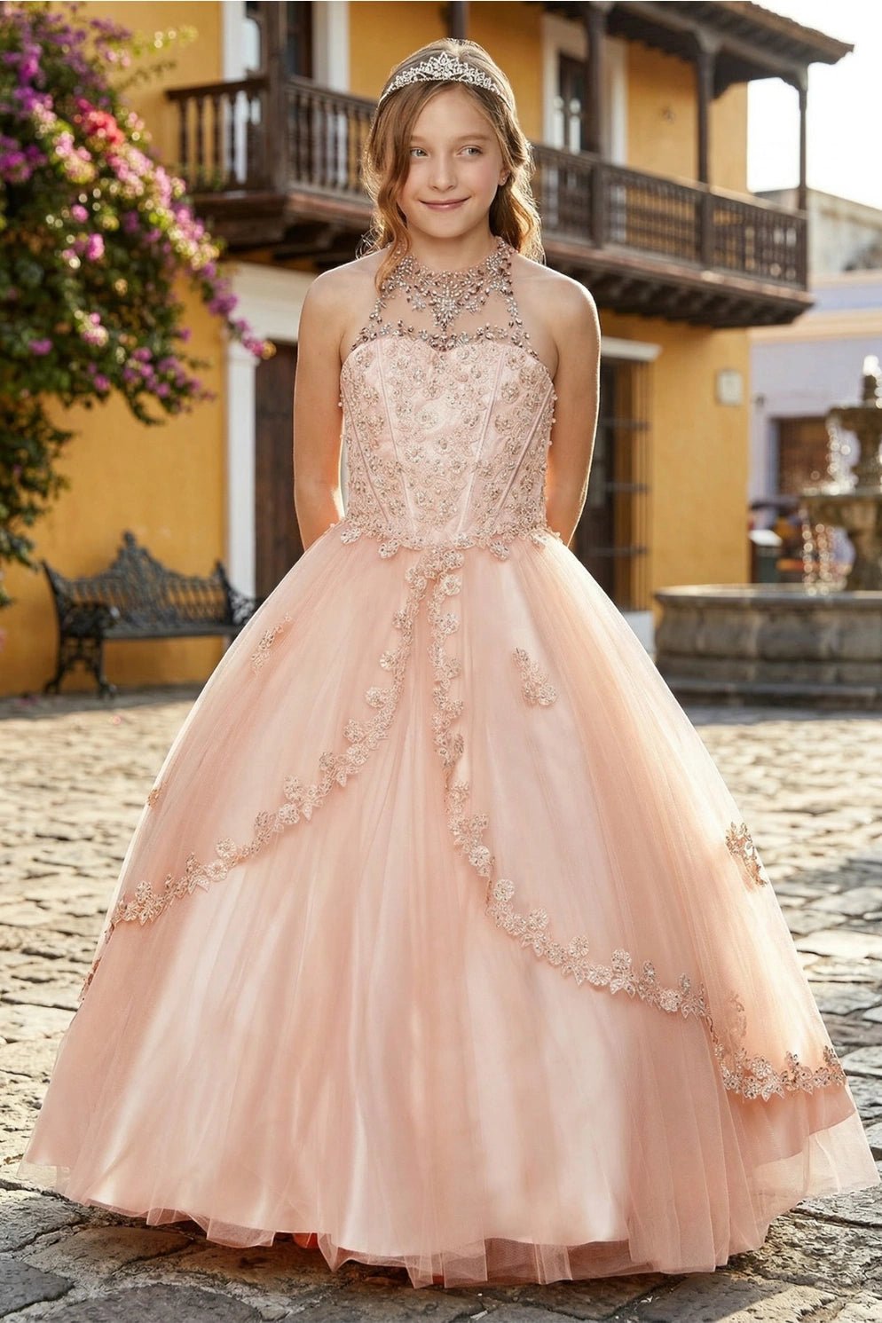 Shown in a front view, the Blush mini quince dress has halter neckline and floral embellished bodice.