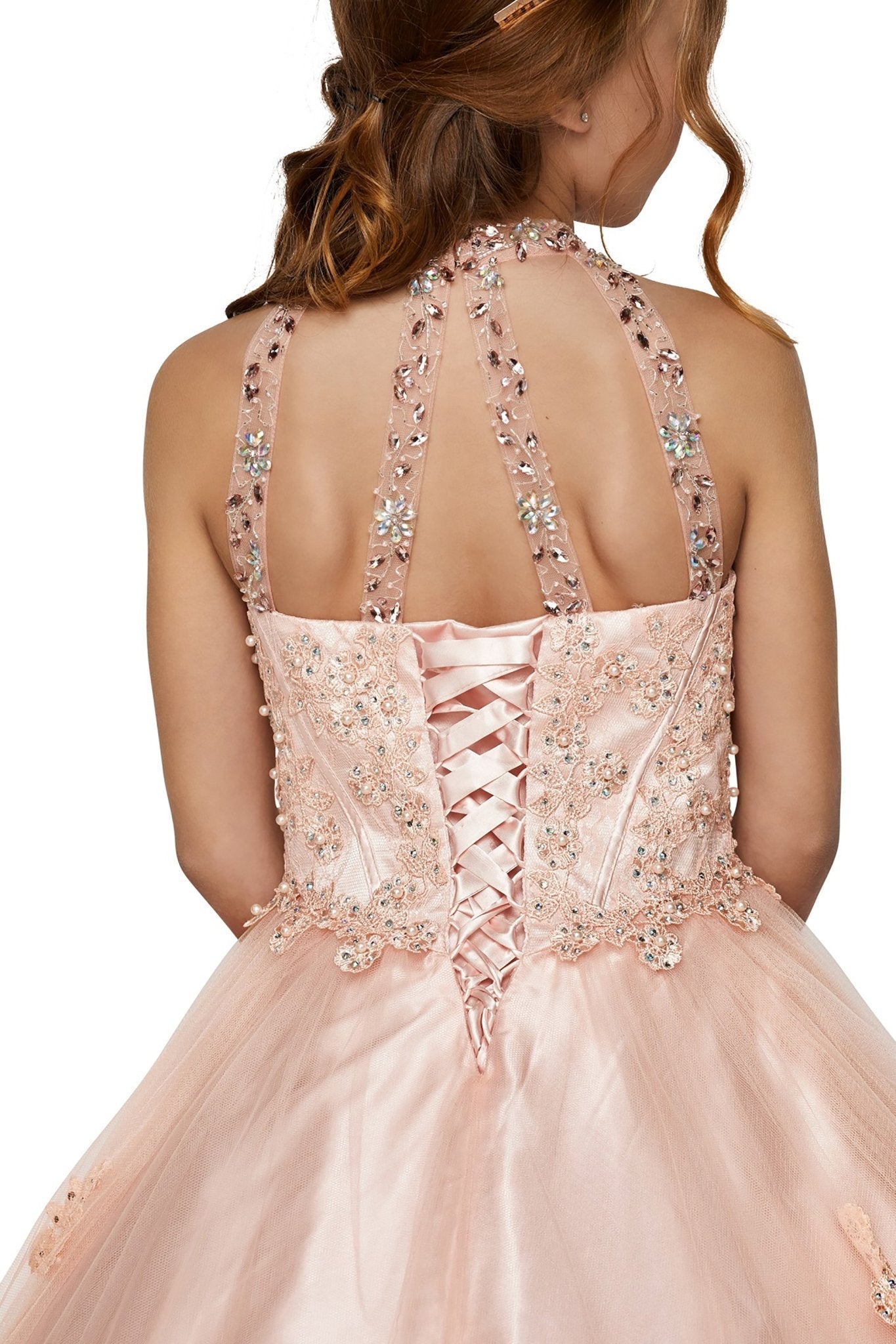 Blush front view kids mini quinceañera mini quince dress with halter neck, rhinestones, pearls, tulle skirt.