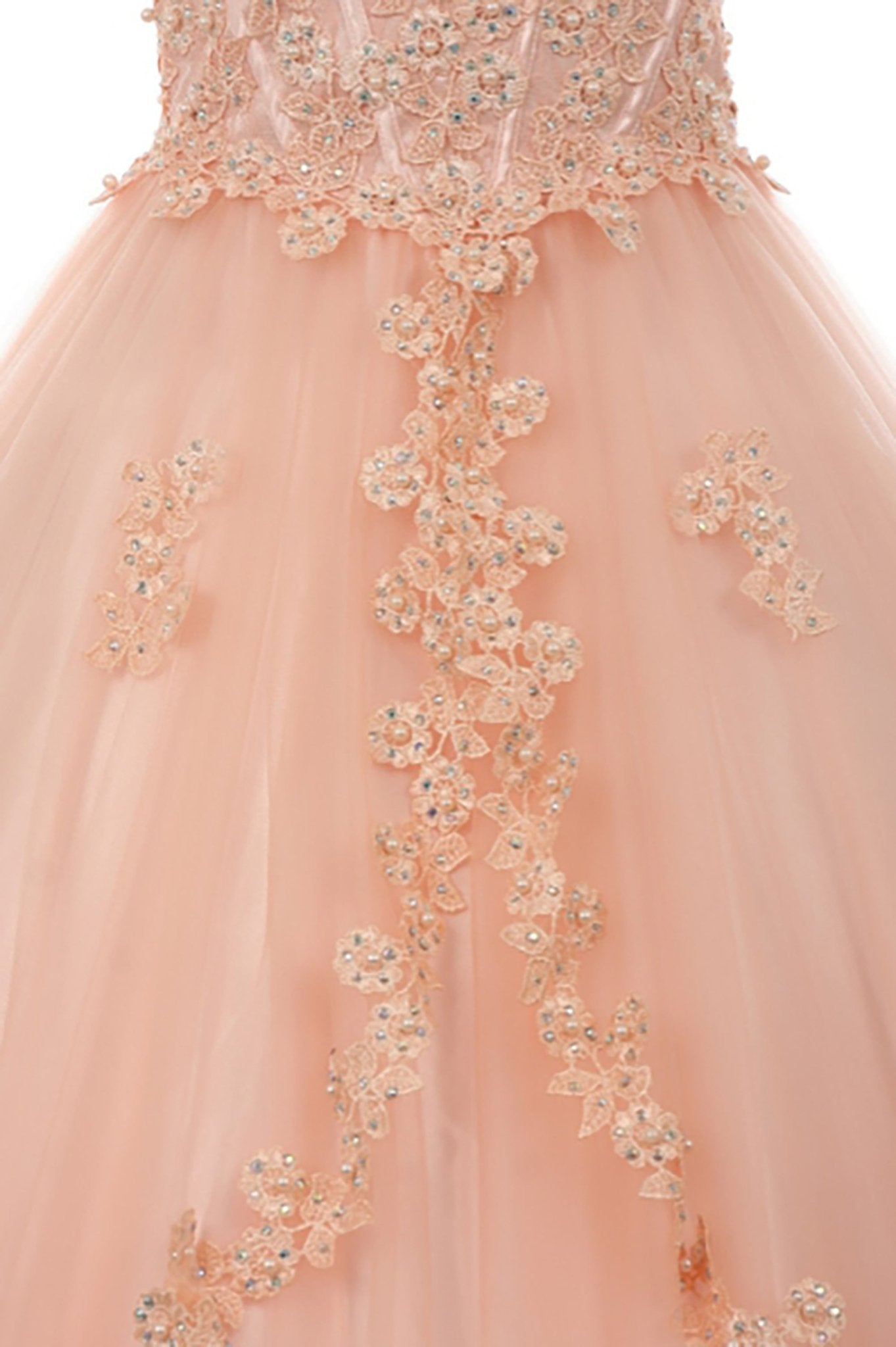 Blush detail view kids mini quinceañera mini quince dress with halter neck, rhinestones, pearls and layered tulle fabric.