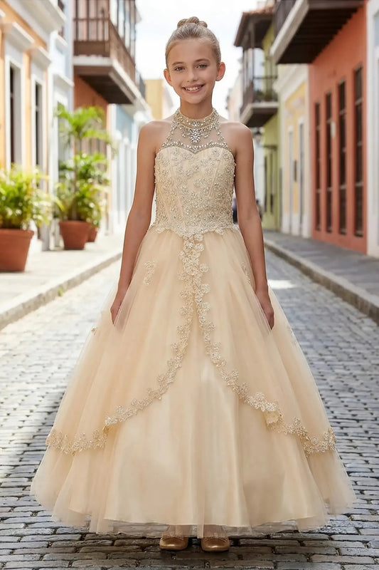 Champagne front view kids mini quinceañera mini quince dress with halter neck, rhinestones, pearls and layered tulle skirt.