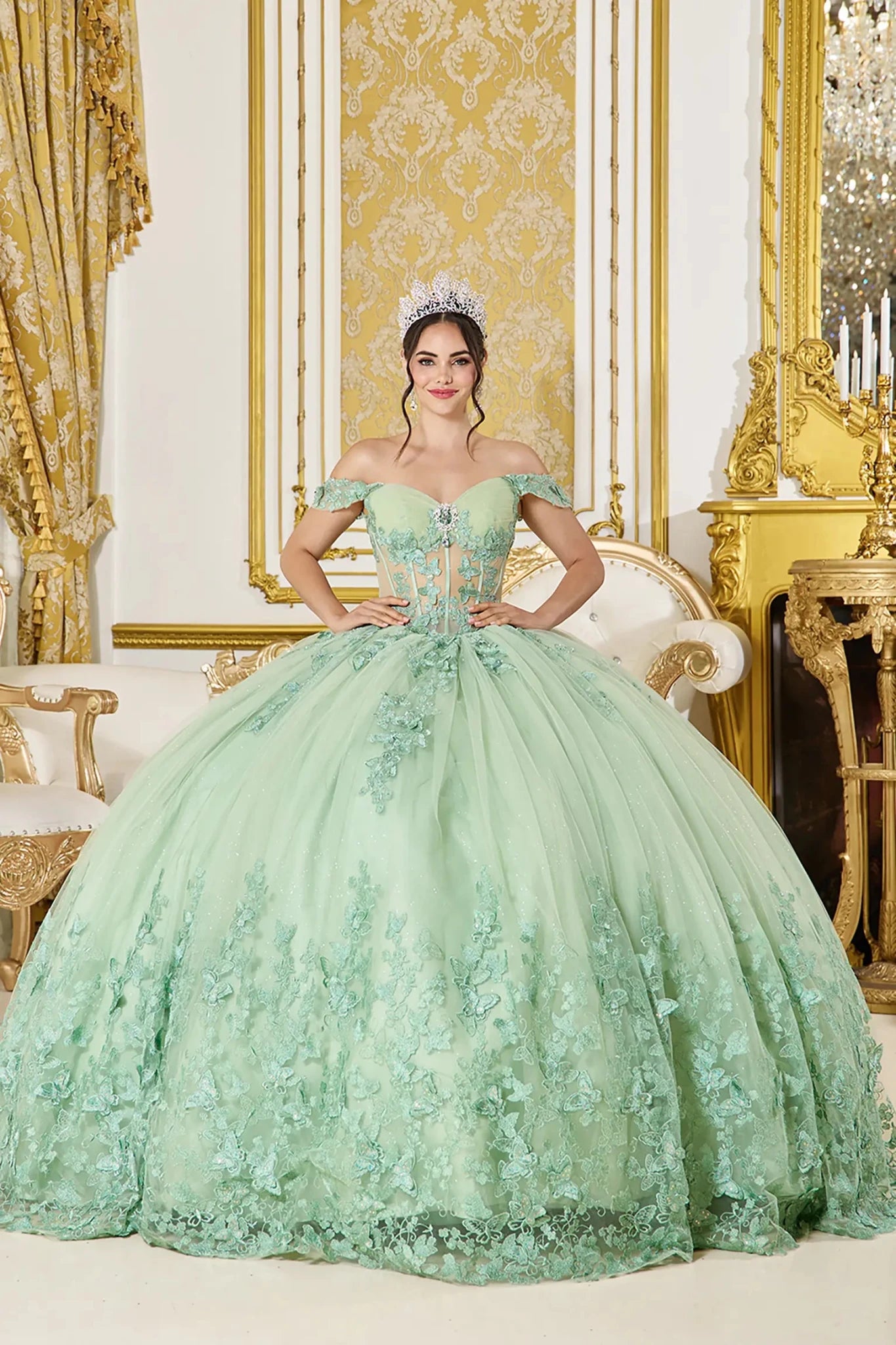 Sage green quinceañera ball gown with off-the-shoulder corset and floral lace appliqués, front view