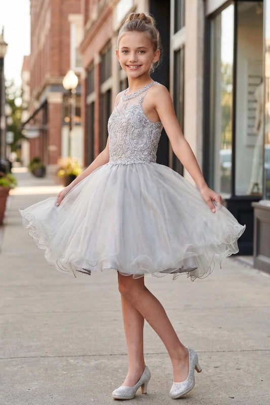 Finished details of crossed halter straps distinguish the Silver kids party dress.