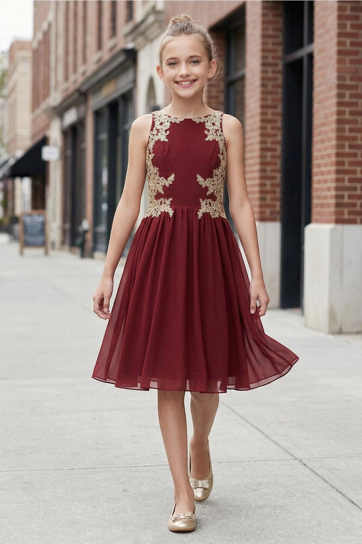 Showcasing with contrasting floral appliques on the bodice, this Burgundy kids party dress displays elegant detail.