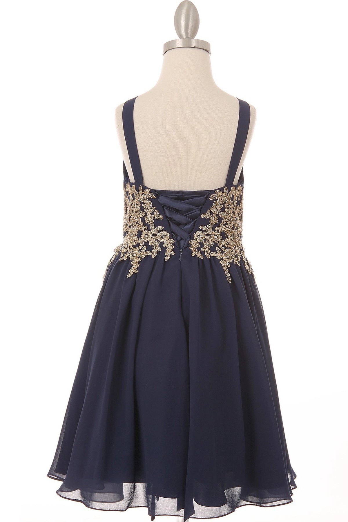 Finished details of floral appliques framing back lacing distinguish the Navy kids party dress.