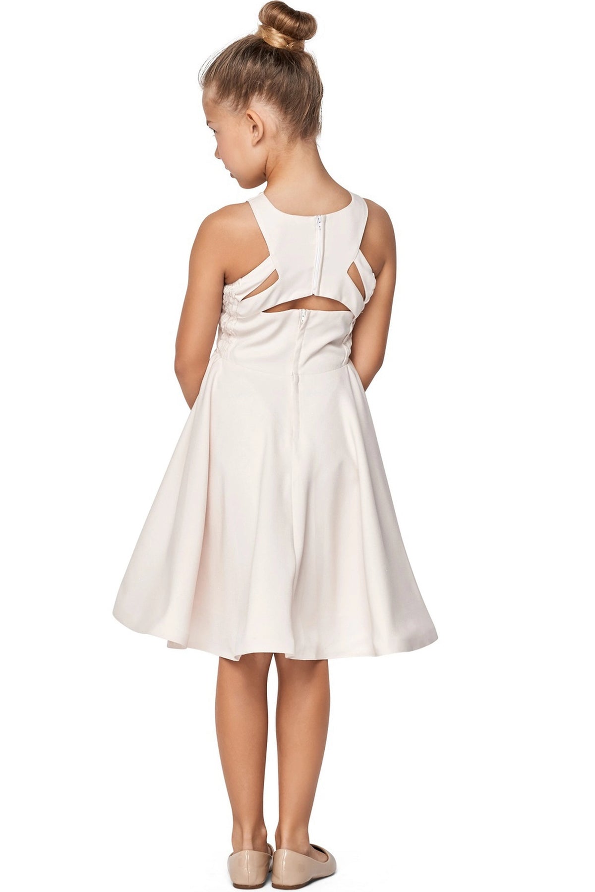 Finished details of a cutout back and bow distinguish the Cream kids party dress.
