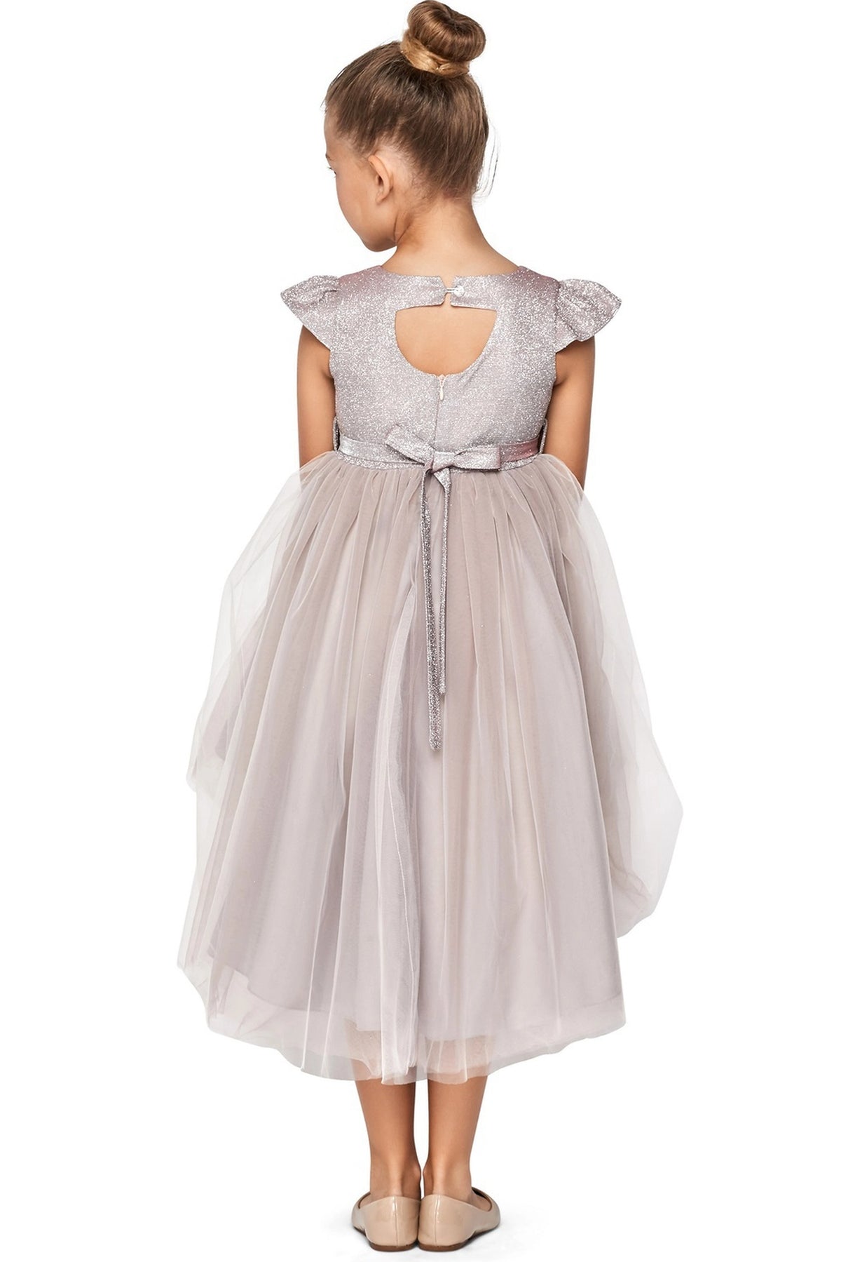 Finished details of a high-low layered hem distinguish the Mauve kids party dress.