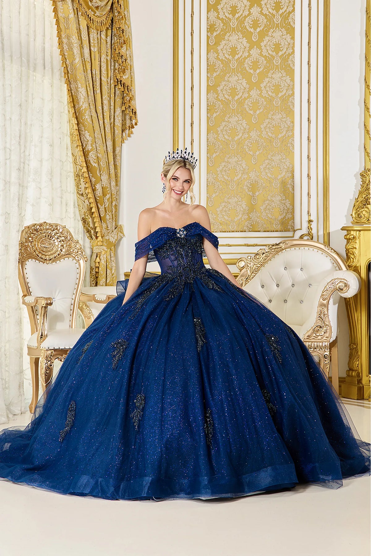 Featuring a floor-length skirt, this Navy quinceañera ball gown is shown in full view.