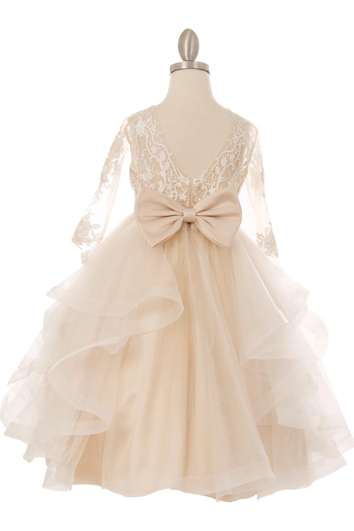 Highlighted a jeweled waist accent adds character to this Champagne kids party dress.