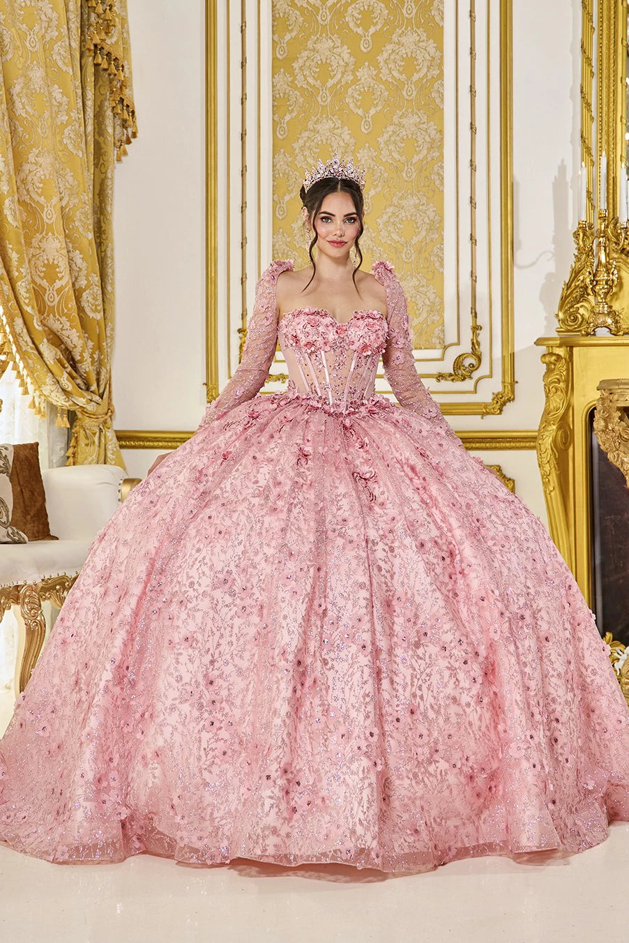 blush quinceanera dress with floral embroidered bodice, visible boning, and sheer long sleeves