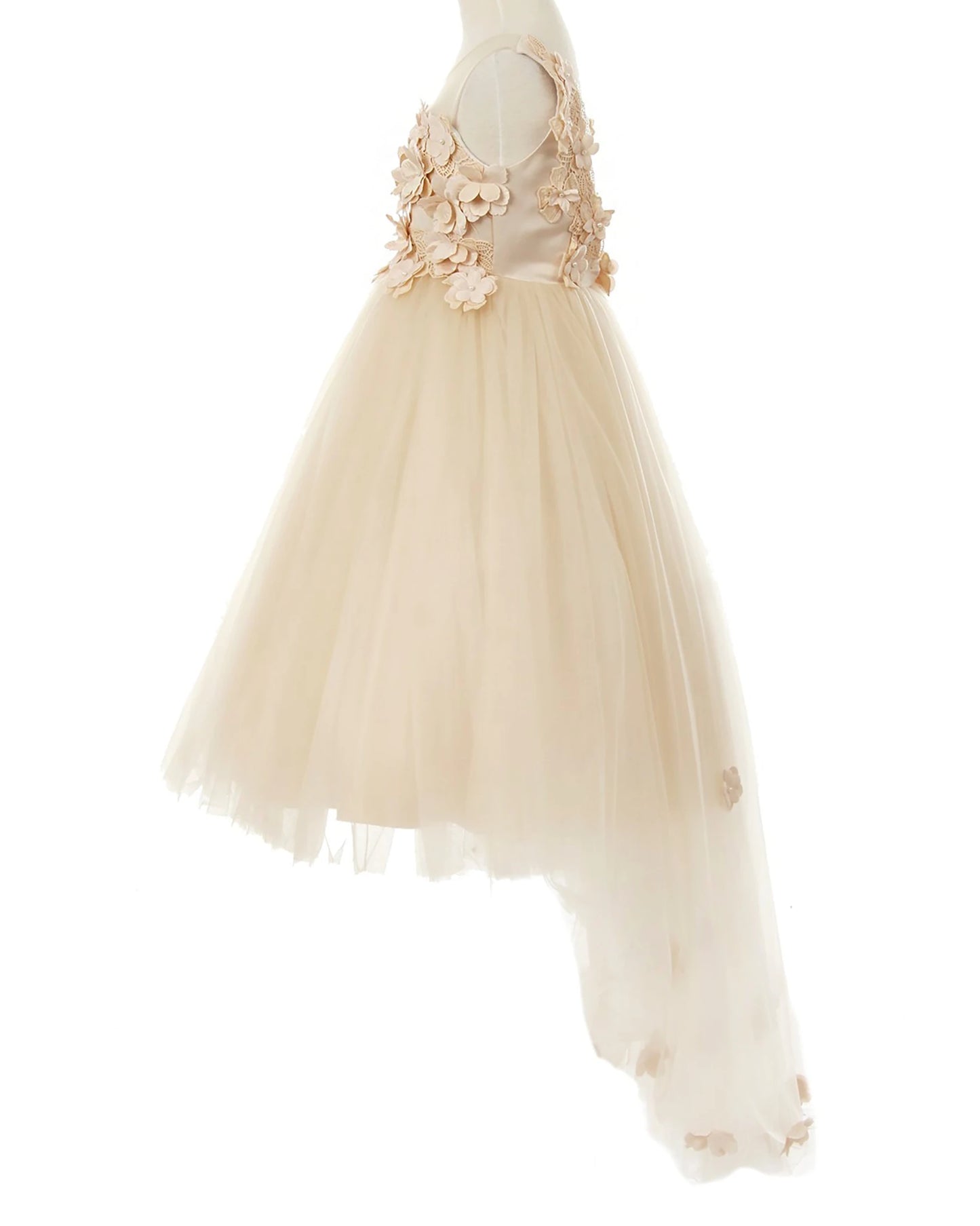 Champagne flower girl dress with floral embellishments.