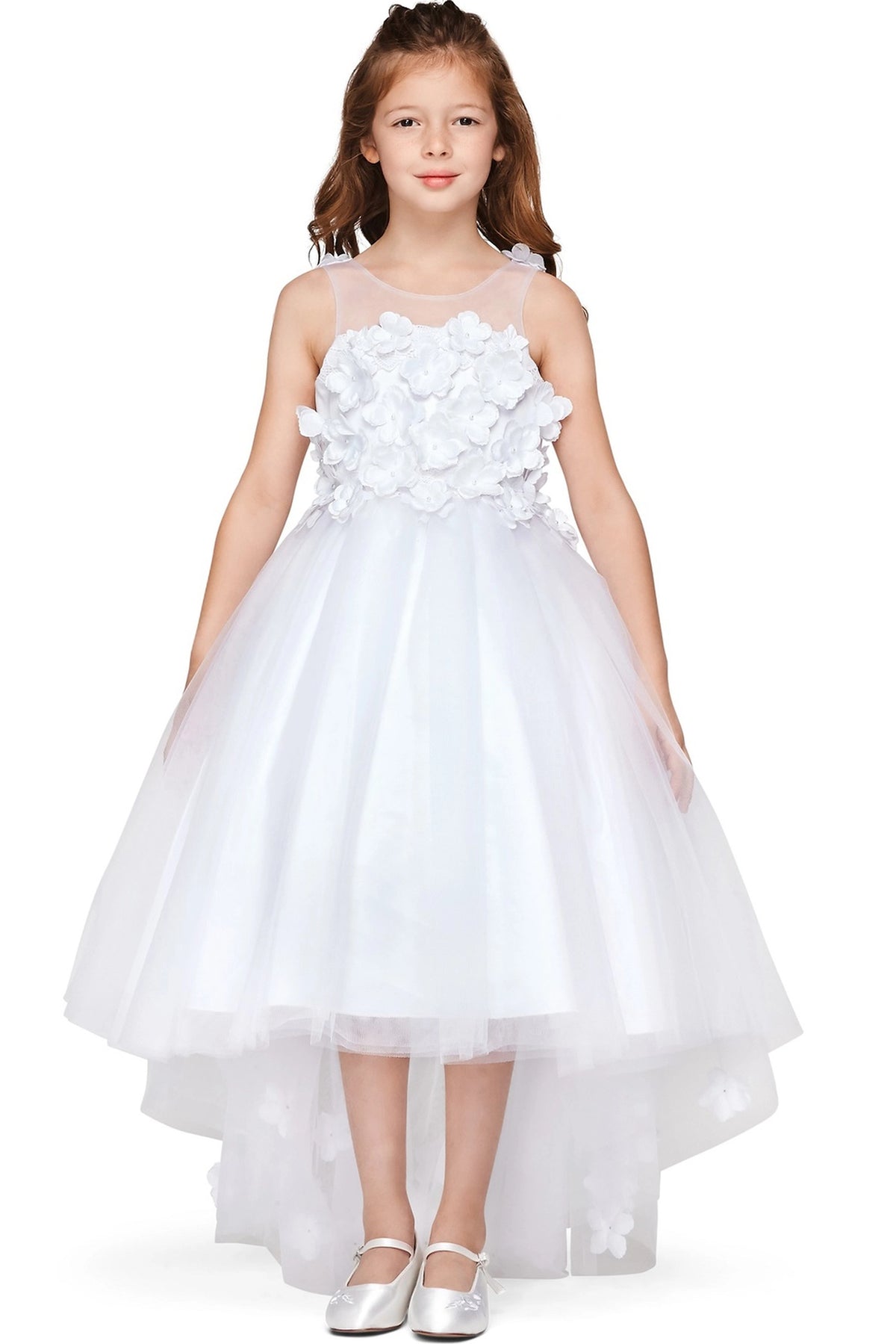 Showcasing with dimensional flower appliques on the bodice, this White kids party dress displays elegant detail.