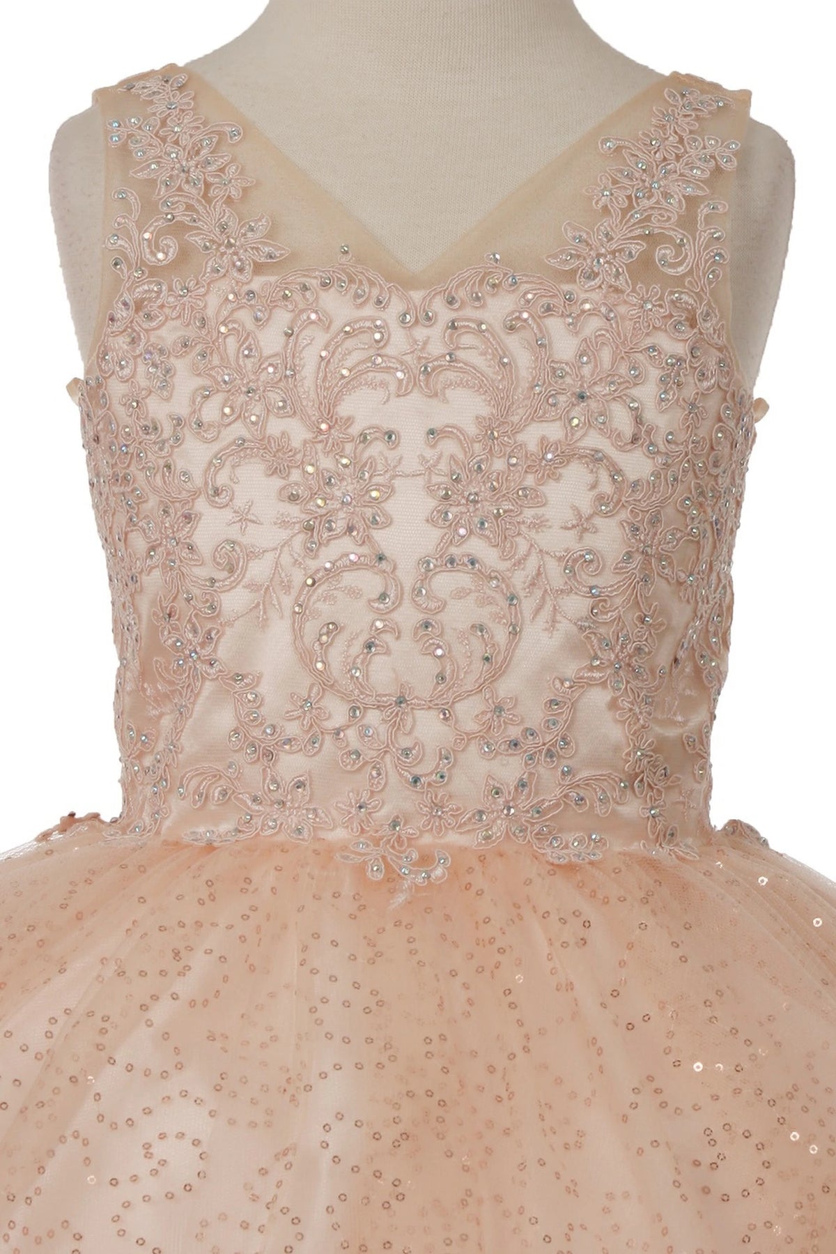 Finished details of a glittered tulle skirt distinguish the Blush kids party dress.