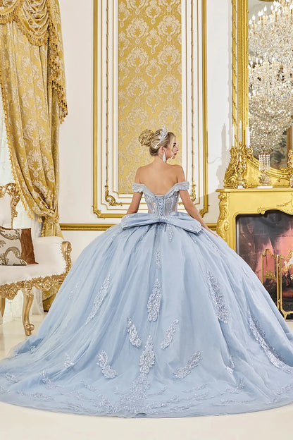Dusty blue quinceanera ball gown back view showing lace up corset back, oversized bow accent, embroidered tulle skirt, and sweeping train