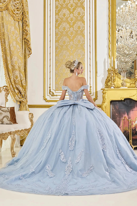 Dusty blue quinceanera ball gown back view showing lace up corset back, oversized bow accent, embroidered tulle skirt, and sweeping train