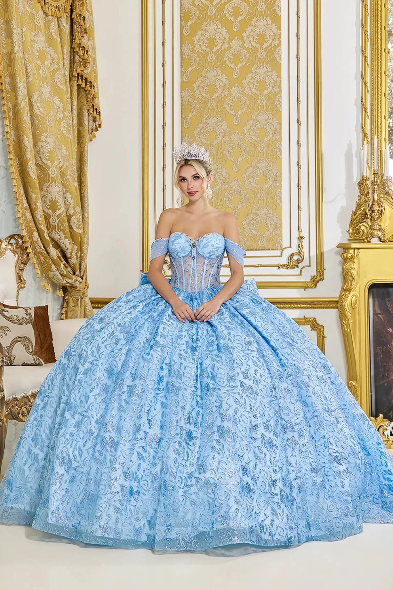 Bahama blue quinceanera ball gown front view featuring off the shoulder sweetheart corset bodice, sheer boning detail, textured jacquard fabric, and full voluminous ball gown skirt