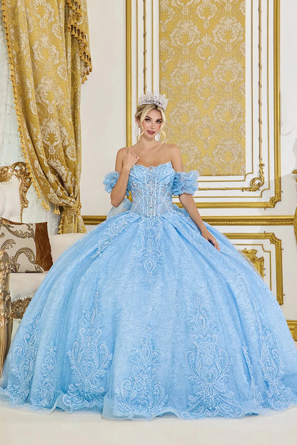 Front view of light blue quinceañera ball gown with off-the-shoulder ruffled sleeves, embellished corset bodice, and full glitter lace skirt in an elegant interior