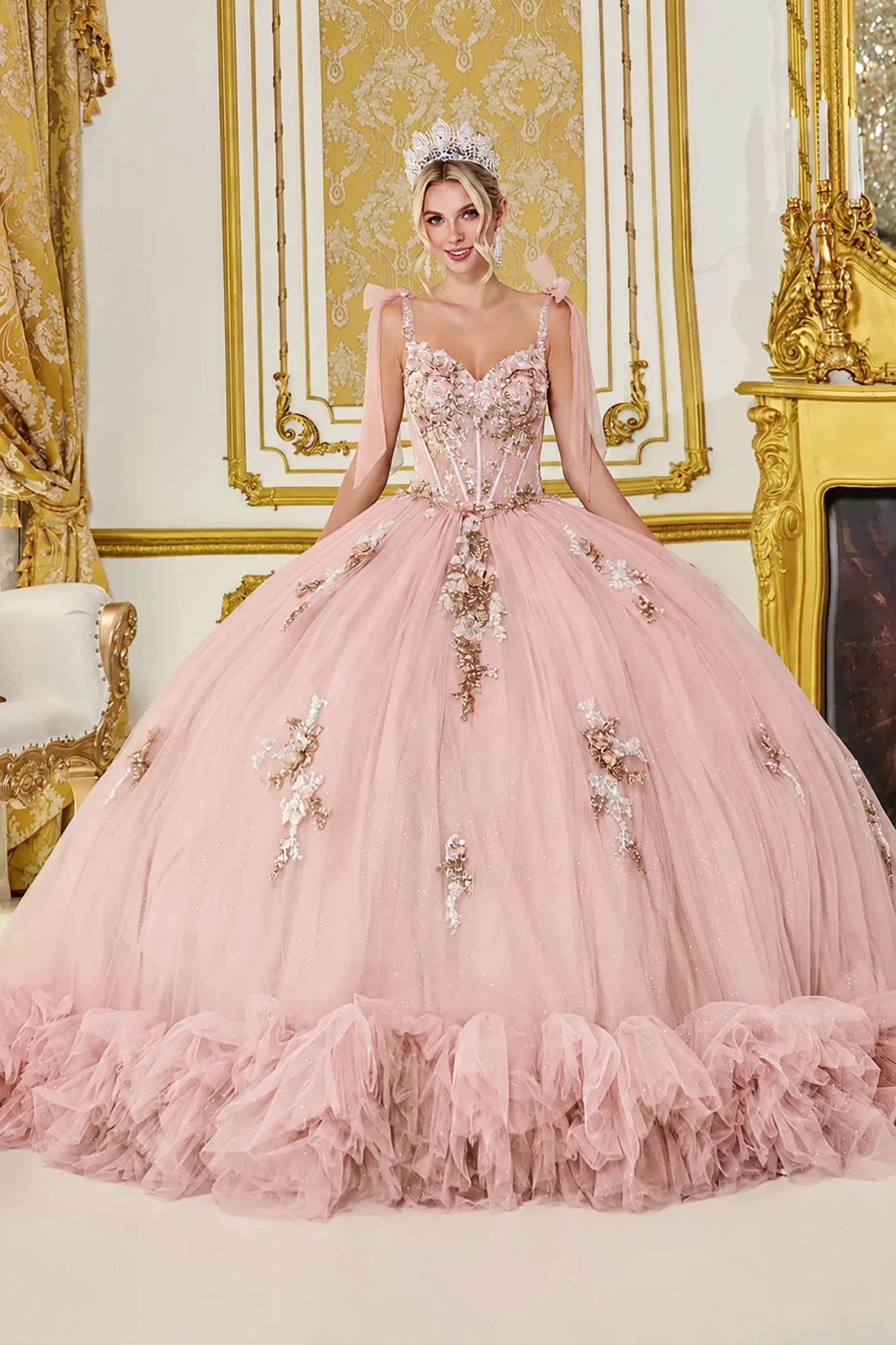 Blush quinceanera ball gown with floral beaded corset and ruffled tulle skirt