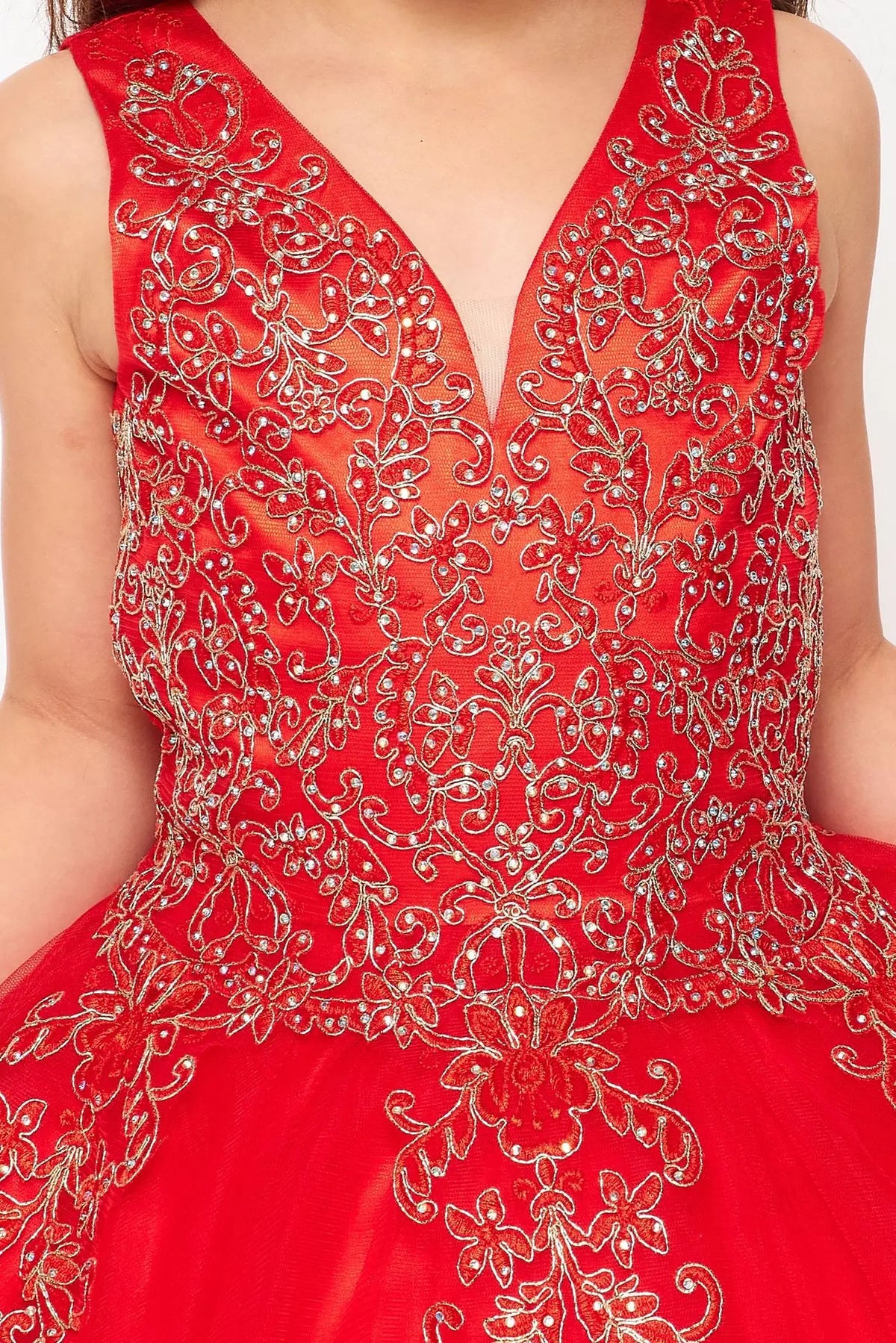 Detailed by contrasting ornamental lace on the bodice, the Red kids party dress reveals its construction.