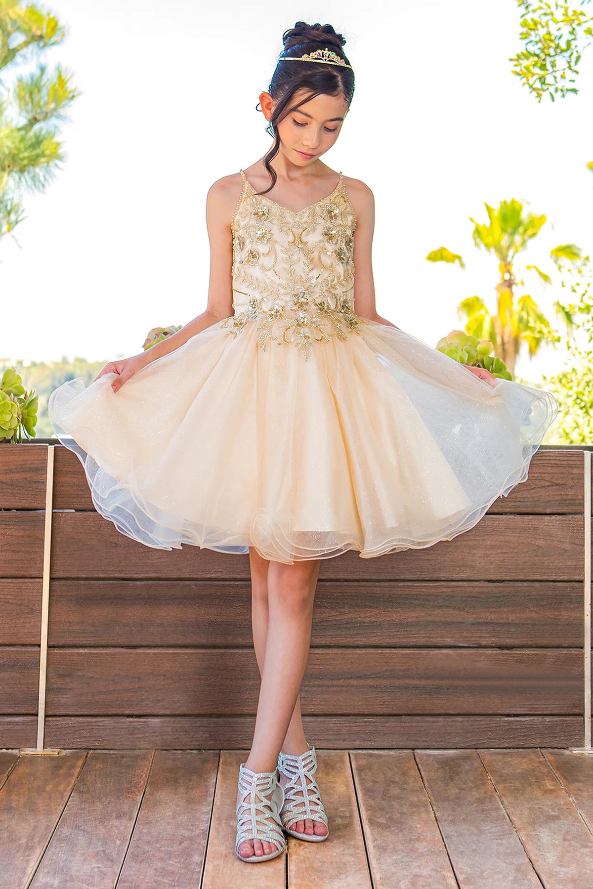 Showcasing with floral beadwork across the bodice, this Champagne kids party dress displays elegant detail.