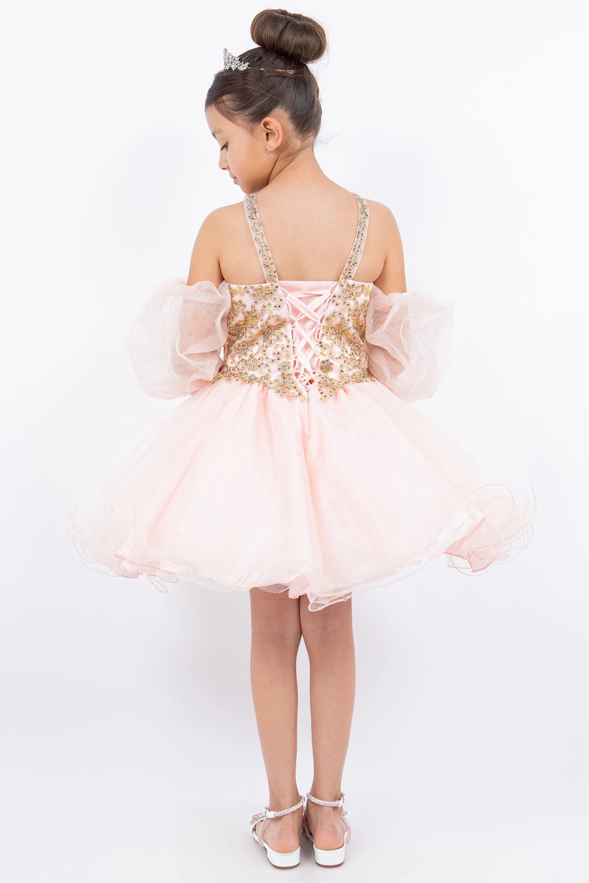 Finished details of floral lace across the back bodice distinguish the Blush kids party dress.