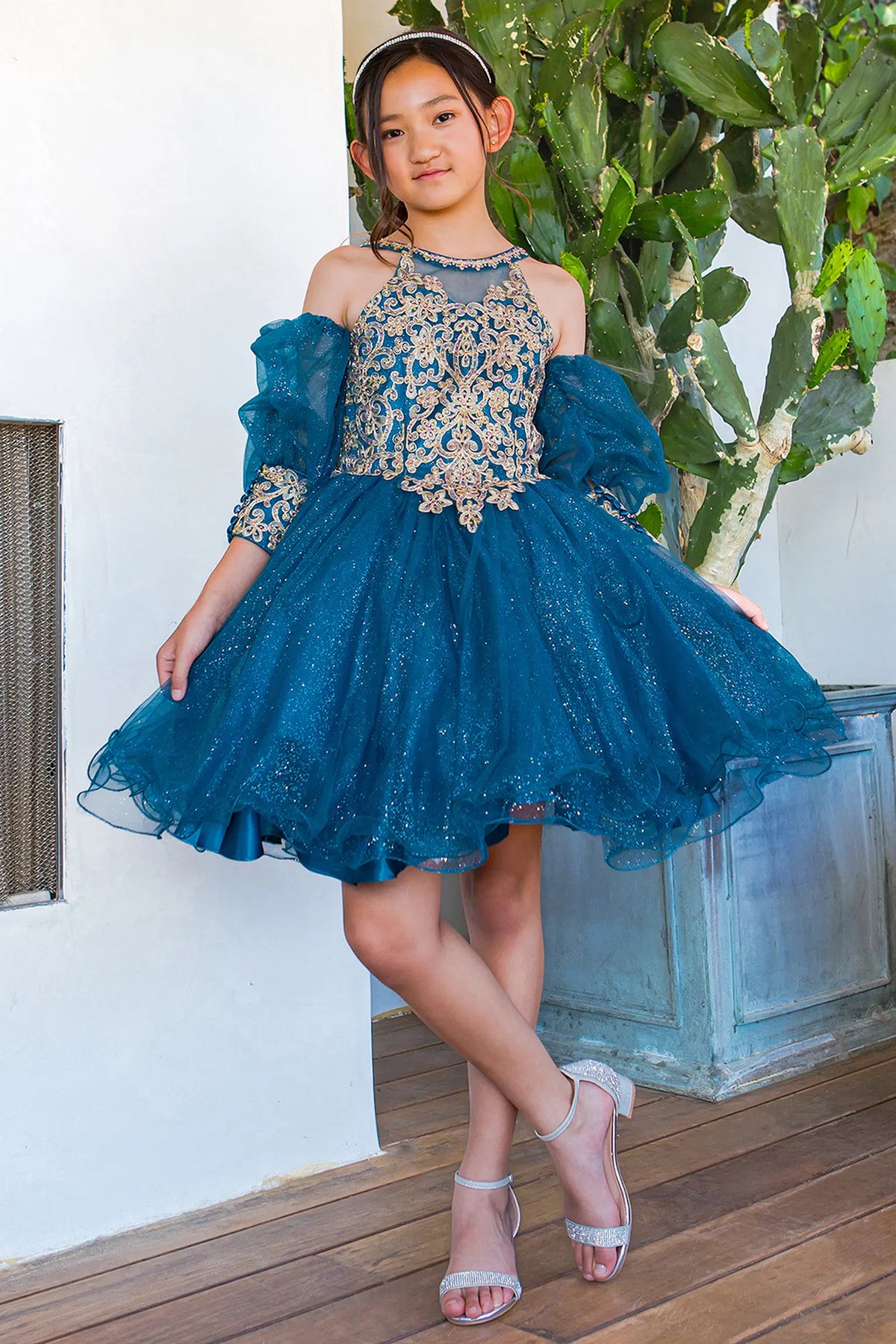 Peacock kids party dress with gold floral lace and sheer puff sleeves.