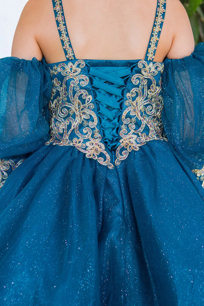 Contrasting floral scrollwork surrounds the laced back of the Peacock kids party dress.