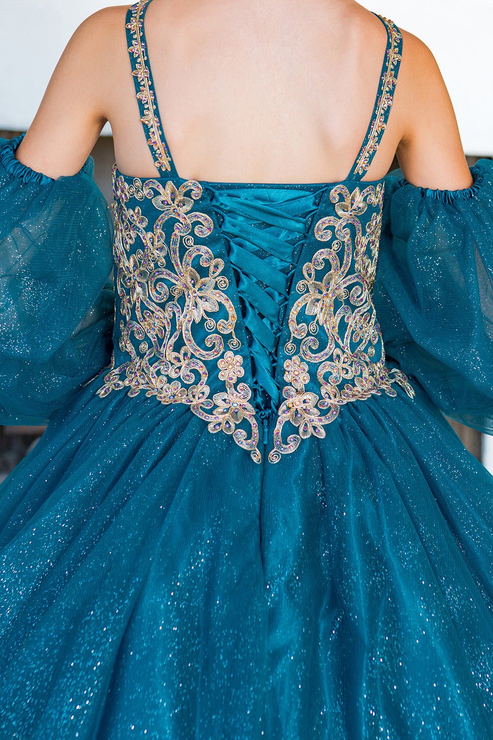 Close-up back view of peacock mini quince dress with glitter tulle detachable sheer puff sleeves