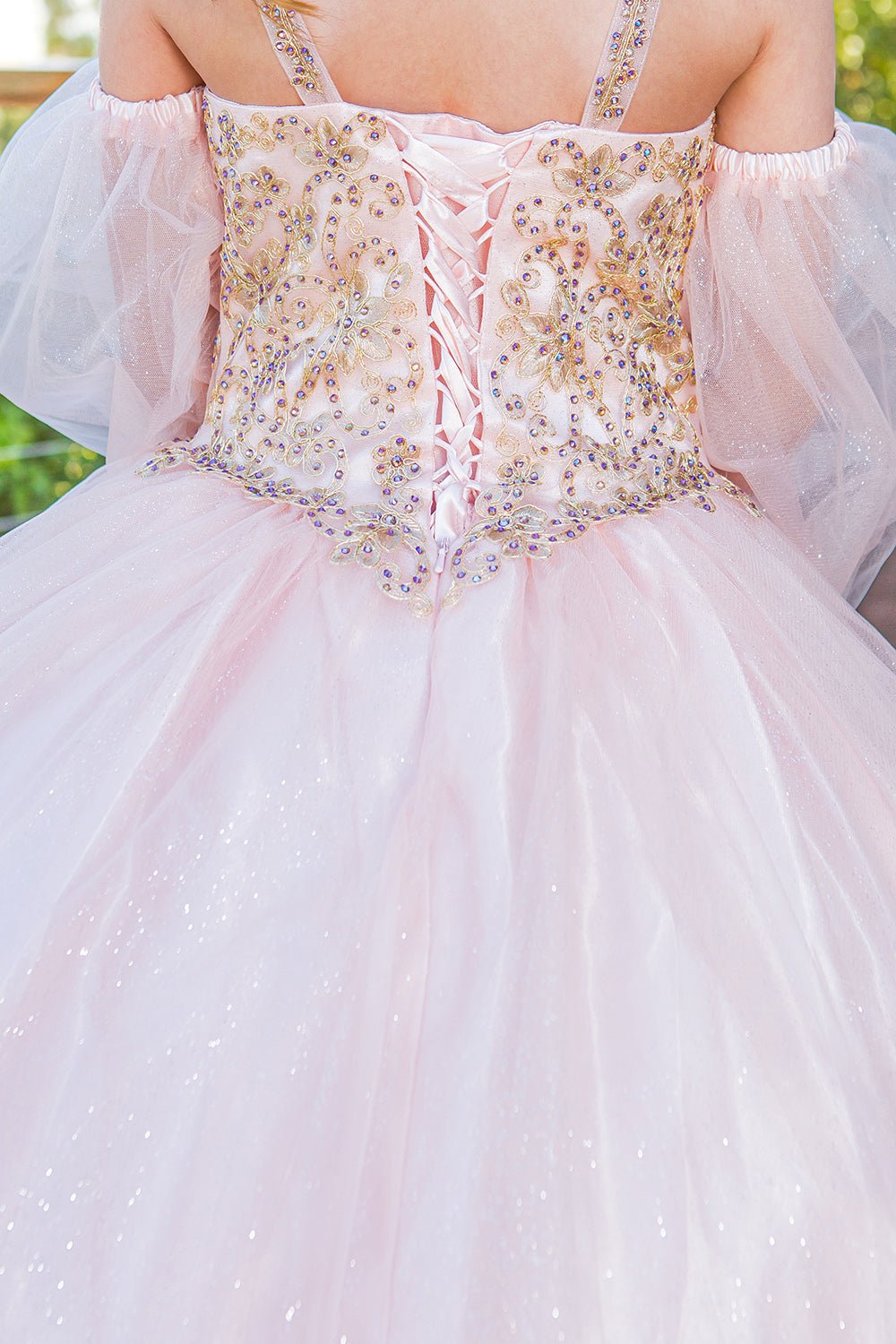 Blush mini quince dress with glitter tulle detachable sheer puff sleeves and back detail.