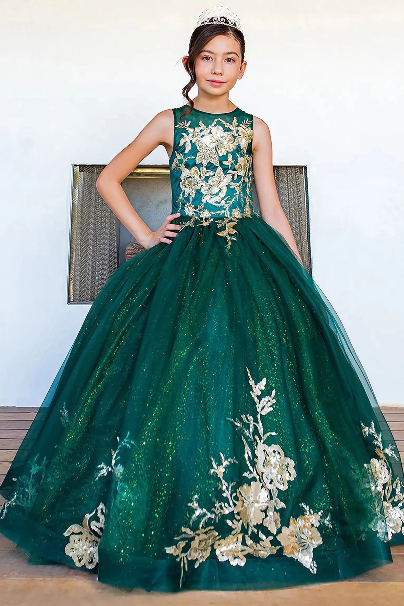 Front view of hunter green mini quince dress with glitter tulle lace-up bodice and layered skirt.