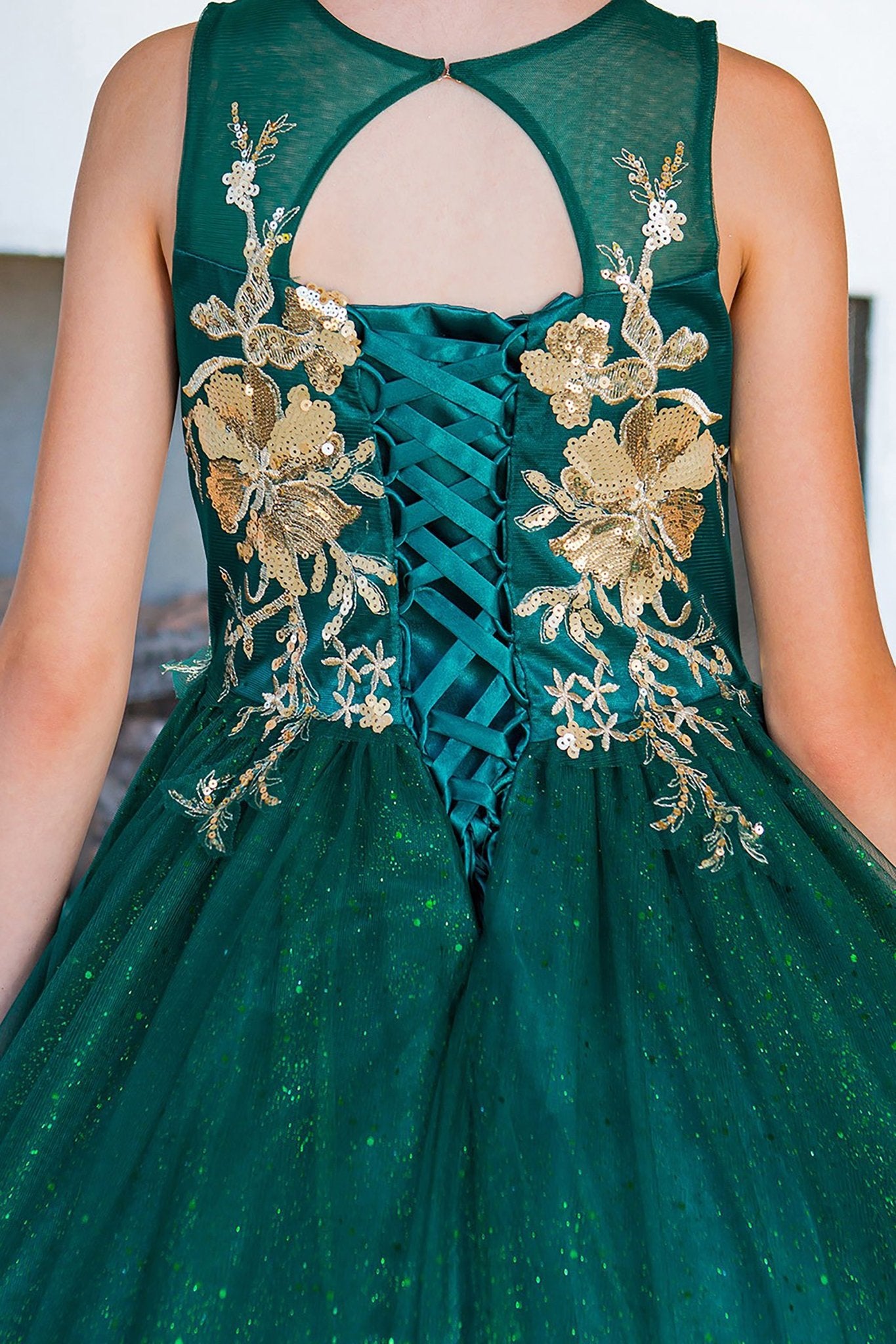 Hunter green mini quince dress with glitter tulle layered skirt and back view.