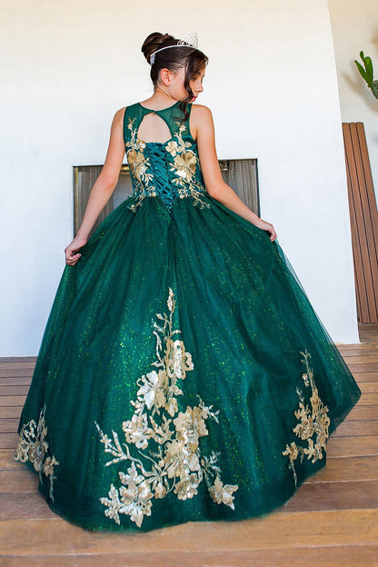 Kid wearing hunter green mini quince dress with glitter tulle layered skirt and back view