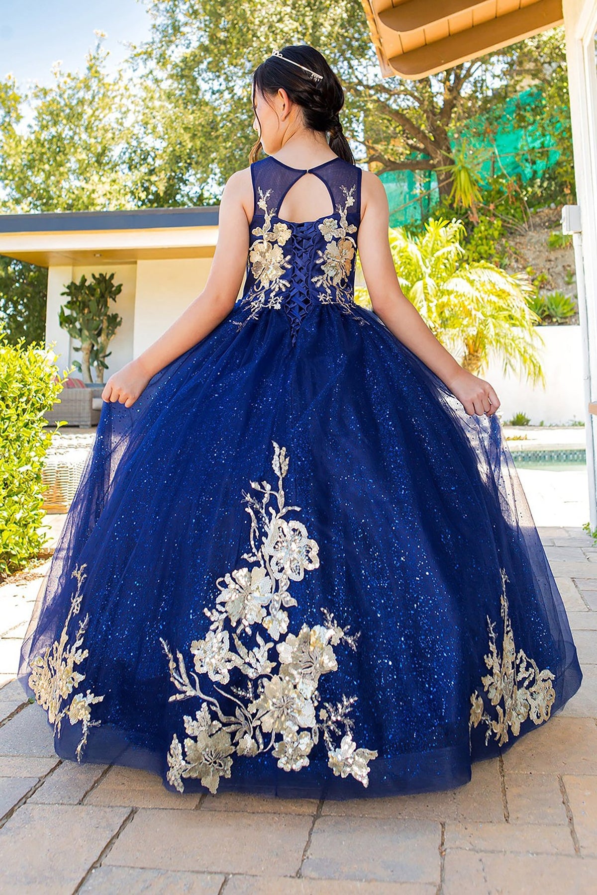 Navy mini quince dress with glitter tulle layered skirt and back view.