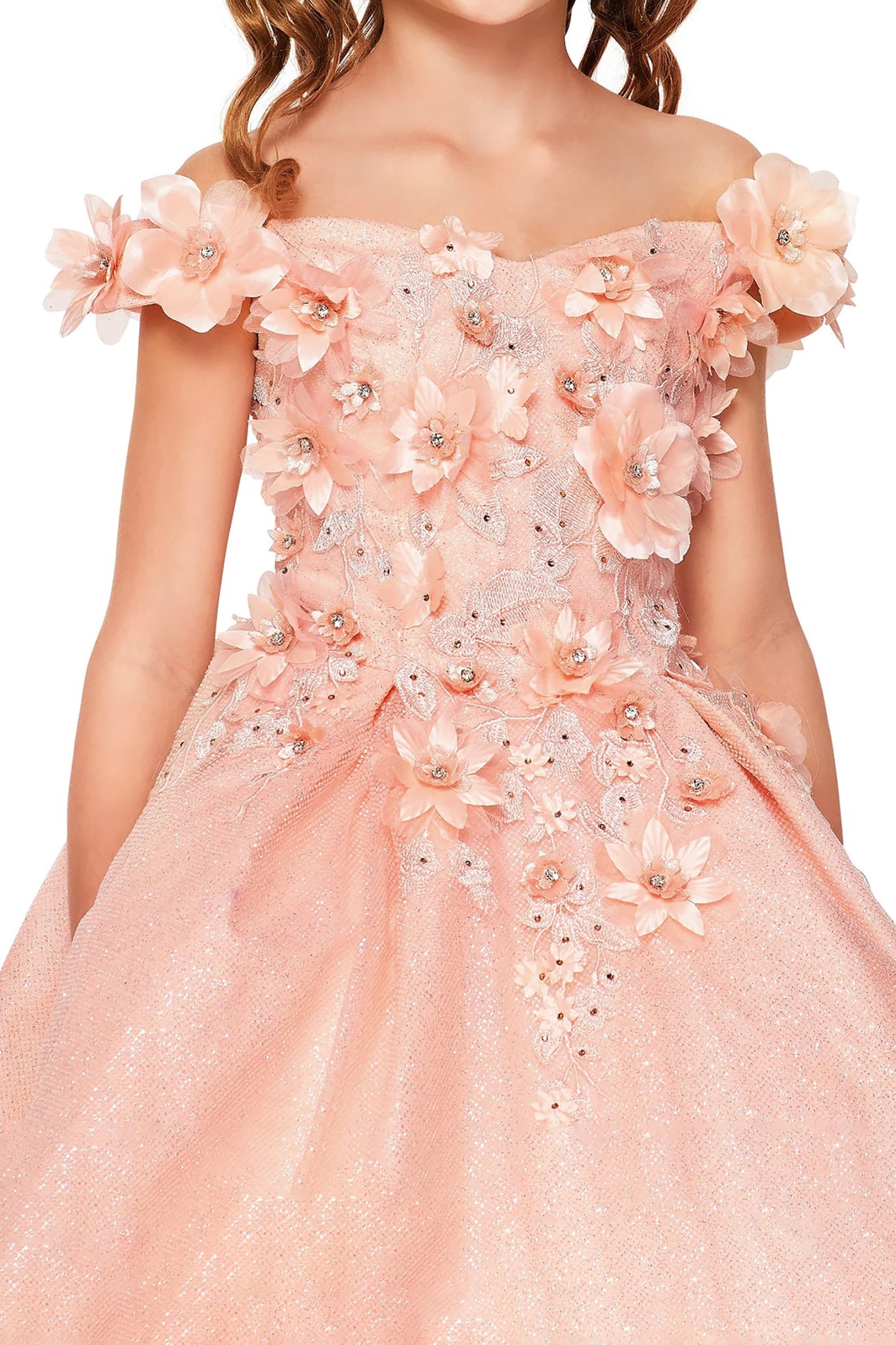 Front view of blush off-the-shoulder flower girl dress with 3D floral appliqué bodice and shiny layered tulle skirt.