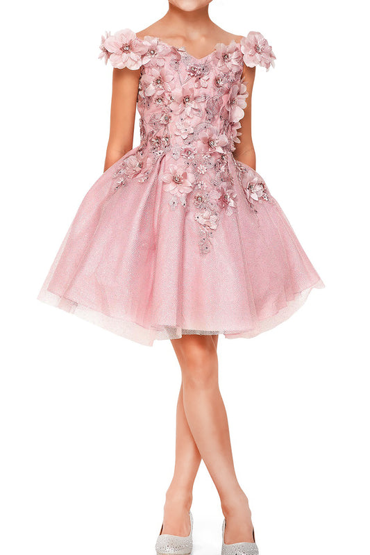 Young girl standing front-facing in dusty rose off-the-shoulder flower girl dress with 3D floral appliqué bodice and shiny layered tulle skirt