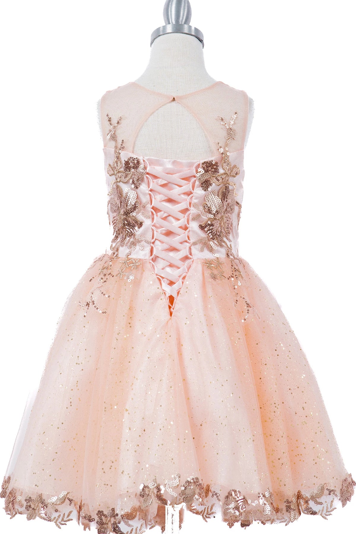 Accented a lace-decorated back bodice adds character to this Blush kids party dress.