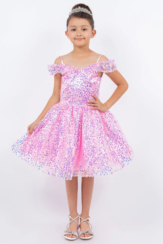 Embellished by a laced back bodice, the Pink kids party dress reveals its construction.