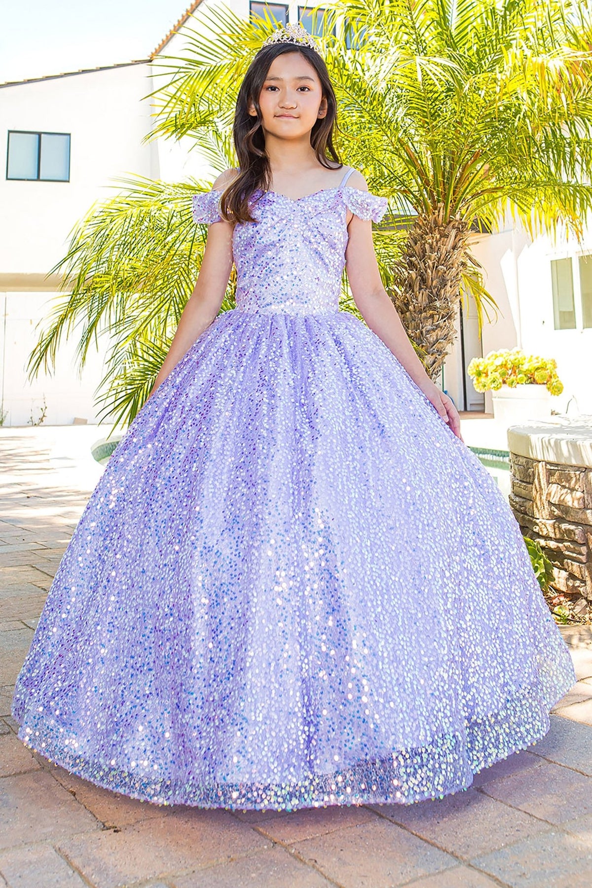 Full-length view highlights Lilac mini quince dress with glitter tulle 3D flower puff print and A-line skirt.
