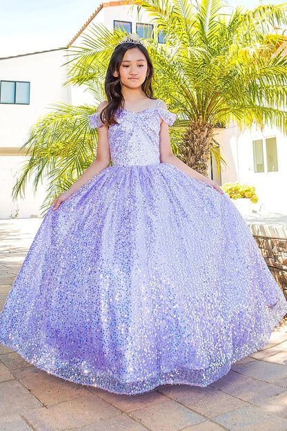 Girl standing front-facing in lilac mini quinceañera dress with sparkling fabric, delicate 3D flower puff print, fitted bodice, and elegant A-line skirt