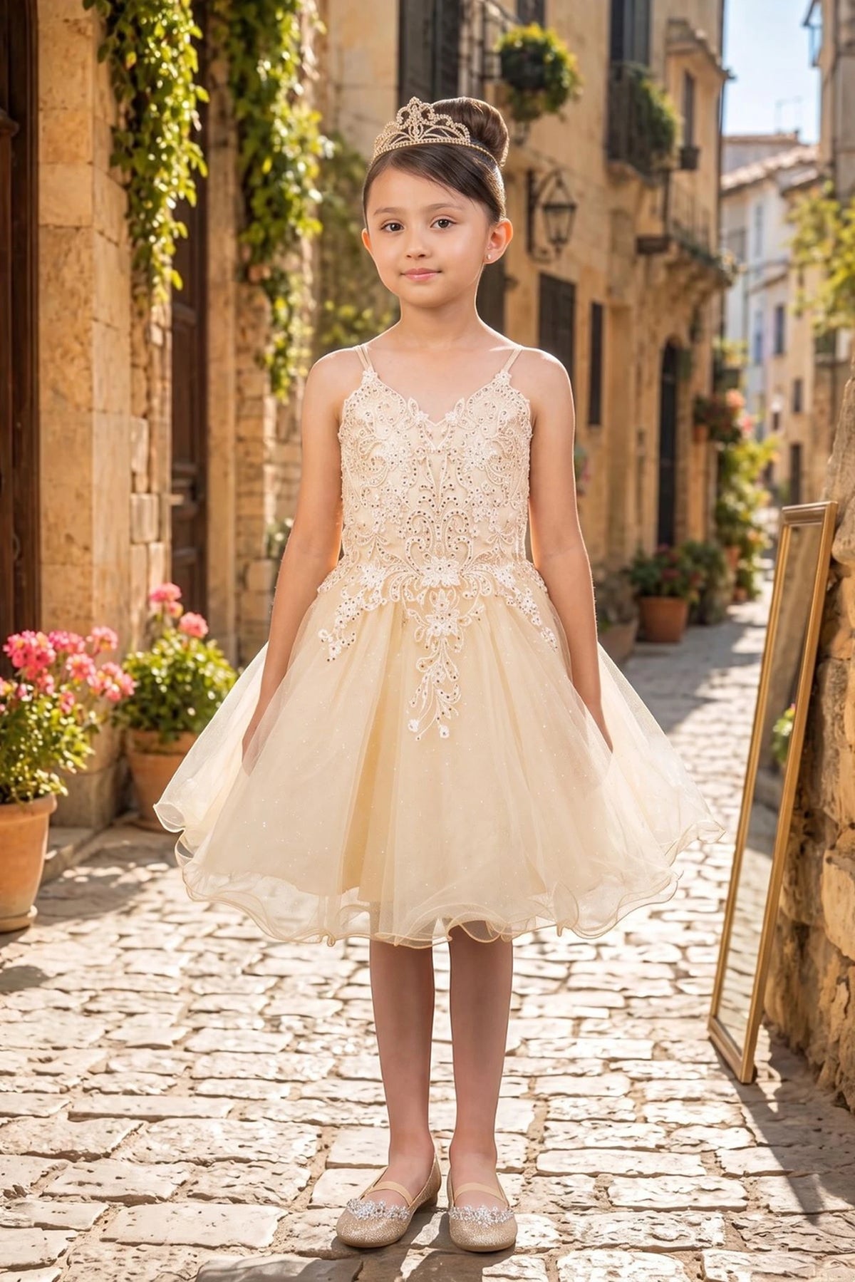 Featuring with a soft tulle skirt, this Champagne kids party dress displays elegant detail.